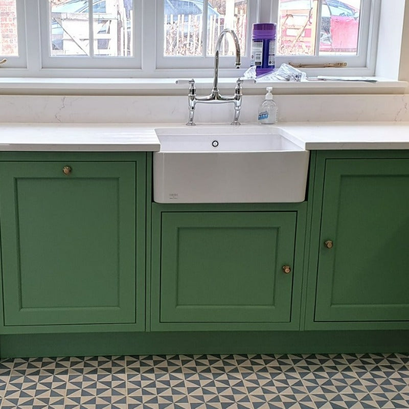 Folly Green No. 76 from Farrow & Ball is a strong but soothing green paint colour. Folly Green No. 76 Farrow & Ball living kitchen cabinet paint colour.