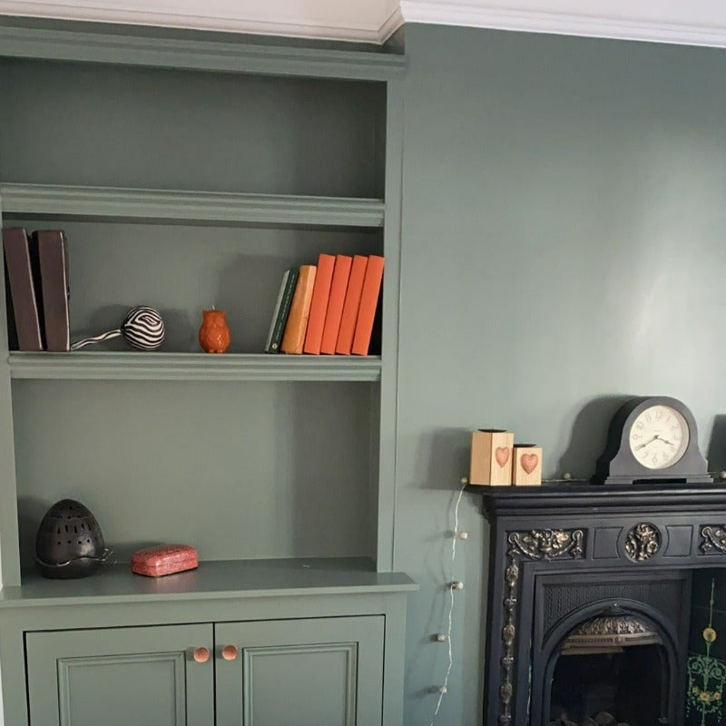 Little Greene Ambleside No. 304 is a dark green paint colour with a muted blue undertone. Living room paint colour. Buy Little Greene paint online.