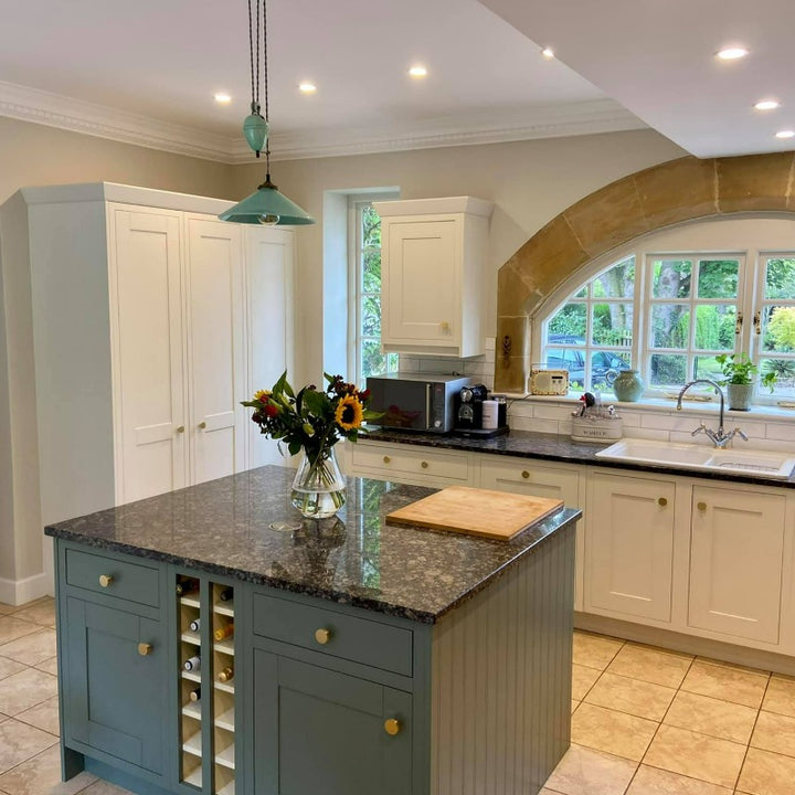 Little Greene Ambleside No. 304 is a dark green paint colour with a muted blue undertone. Kitchen island paint colour. Buy Little Greene paint online.