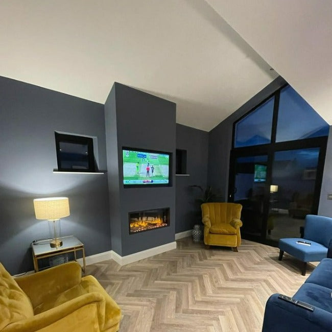 Little Greene Juniper Ash No. 115 is an attractive muted blue paint colour. Order Little Greene Juniper Ash paint online in Ireland. Absolute Matt Emulsion in a sitting room. 