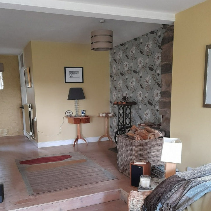 Little Greene Sunlight No. 135 warm yellow paint colour. Sunlight 135 yellow painted living room. Buy Little Greene Sunlight 135 paint online.