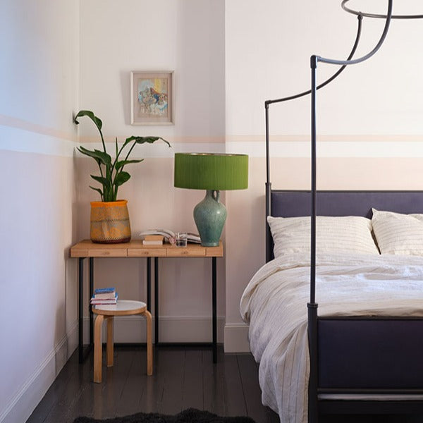 Tailor Tack No. 302 from Farrow & Ball is a delicate pink paint colour. Pink bedroom paint colour. Buy Farrow & Ball paint online. 