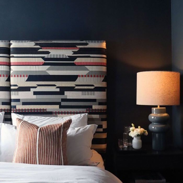 Kigali 678 from Paint And Paper Library. Black bedroom paint colour.