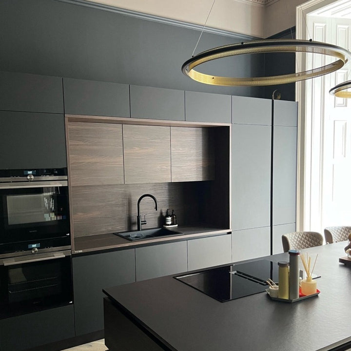 Kohl 124 from Paint And Paper Library. Off black kitchen cabinet paint colour. 