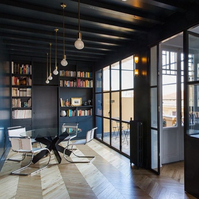 Kigali 678 from Paint And Paper Library. Off black studio paint colour.