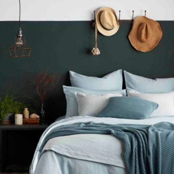 Little Greene Obsidian Green No. 216 is a dark green paint colour. Dark green bedroom paint colour paired with Gauze. Buy Little Greene paint online.