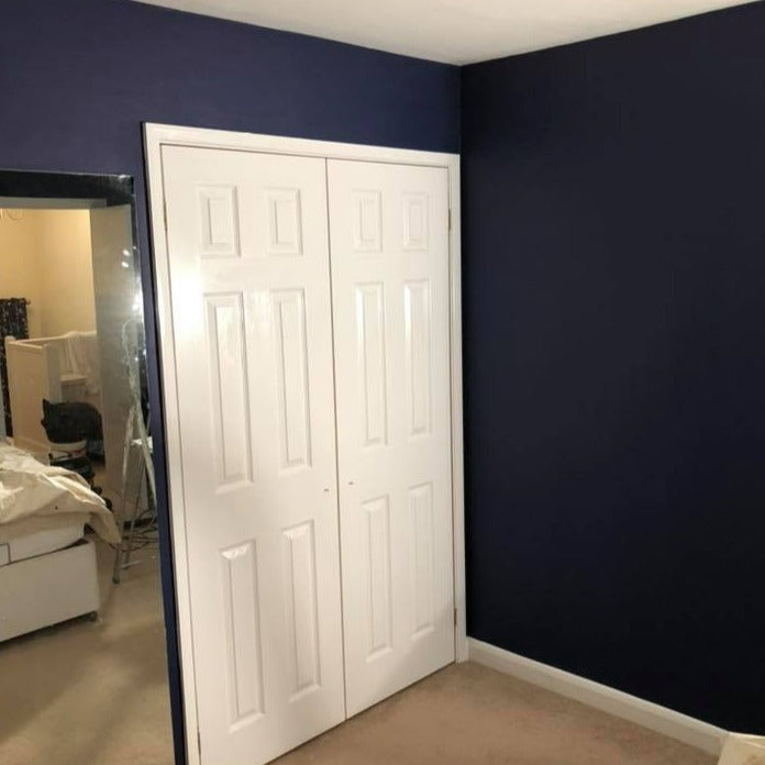 Little Greene Royal Navy No. 257 is a dark blue paint colour. Navy blue bedroom paint colour. Buy Little Greene paint online.