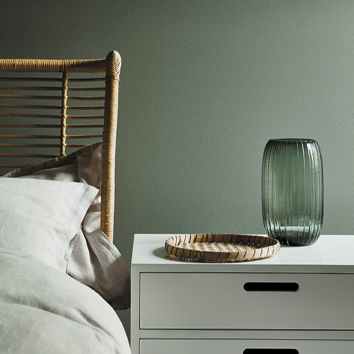 Little Greene Ambleside No. 304 is a dark green paint colour with a muted blue undertone. Bedroom paint colour. Buy Little Greene paint online.