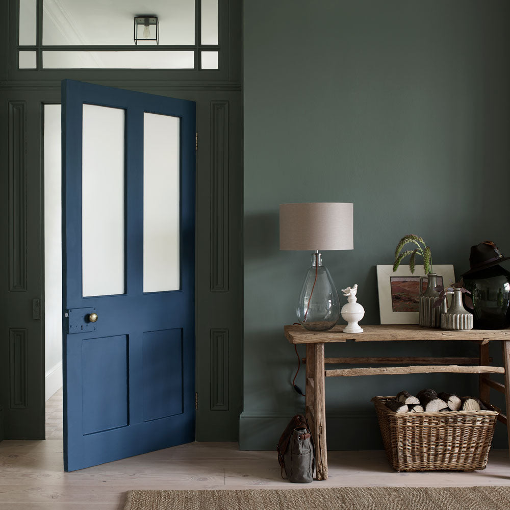 Walls painted in Dulux Heritage Waxed Khaki Velvet Matt Emulsion; Door painted in Dulux Heritage Midnight Teal in Eggshell - Dulux Heritage Paint Online Ireland