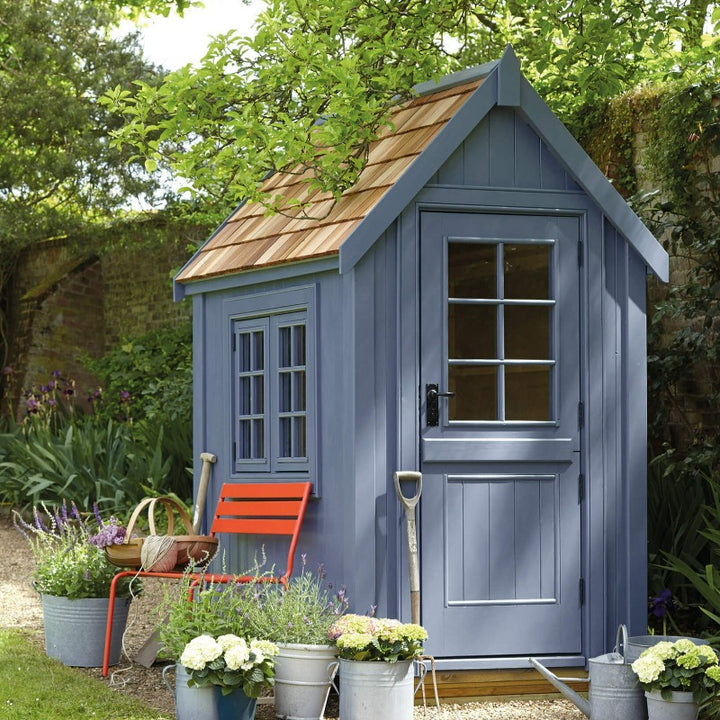 Little Greene Juniper Ash No. 115 is an attractive muted blue paint colour. Order Little Greene Juniper Ash paint online in Ireland. Intelligent Exterior Eggshell on a shed. 