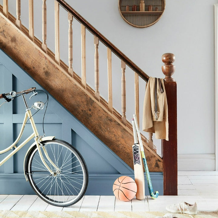 Little Greene Juniper Ash No. 115 is an attractive muted blue paint colour. Order Little Greene Juniper Ash paint online in Ireland. Intelligent Eggshell on stairs.