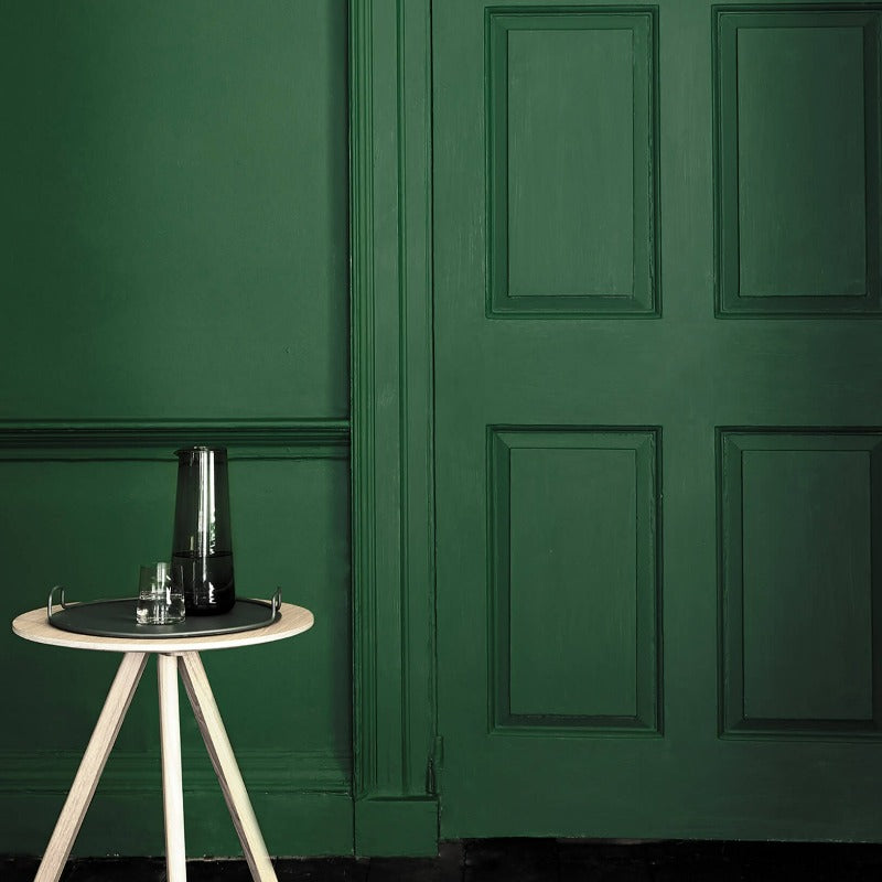 Little Greene Puck No. 298 is a dark green paint colour. This deep green works great in both dark and light spaces. Buy Little Greene Puck 298 living room paint online.