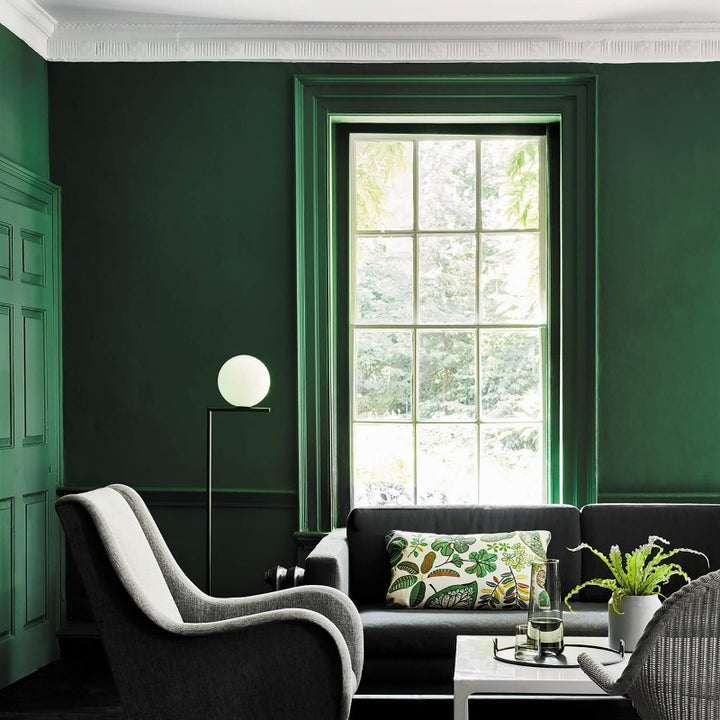 Little Greene Puck No. 298 is a dark green paint colour. This deep green works great in both dark and light spaces. Buy Little Greene Puck 298 living room paint online.