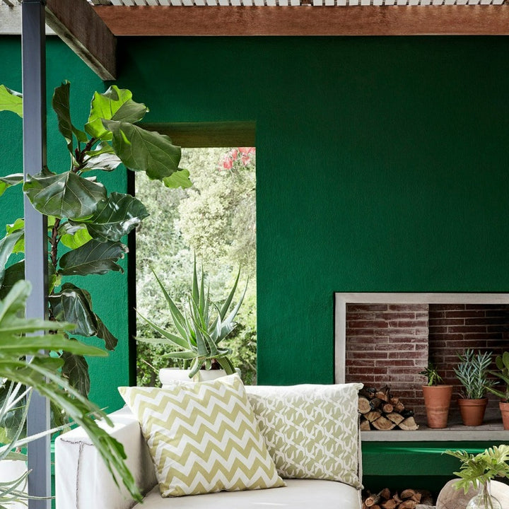 Little Greene Puck No. 298 is a dark green paint colour. This deep green works great in both dark and light spaces. Buy Little Greene Puck 298 paint online.