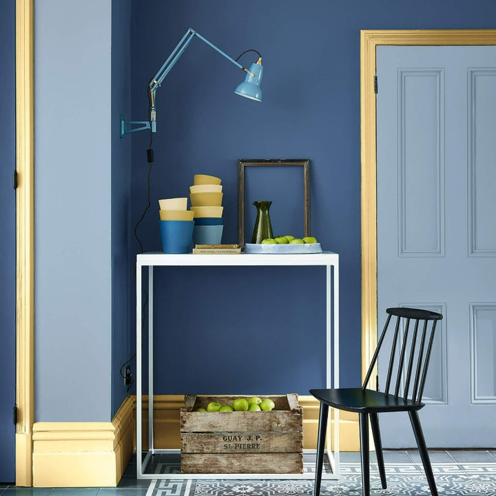 Little Greene Sunlight No. 135 hallway. Sunlight 135 yellow painted skirting and architrave. Buy Little Greene Sunlight 135 paint online.